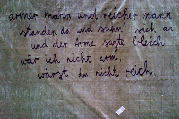 Meisterfotograf-reicher-mann-und-armer-mann